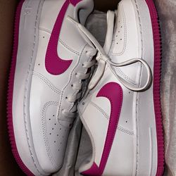 Pink and white Nike