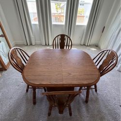 Wood dining/kitchen Table + Leaf + 6 Chairs