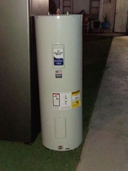 ELECTRIC WATER HEATER 50" GALLON WORKING EXCELLENT WITH 6 MONTHS WARRANTY THERE IS A DELIVERY INSTALLATION FREE $ PLEASE