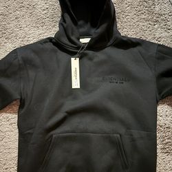 black essientals hoodie