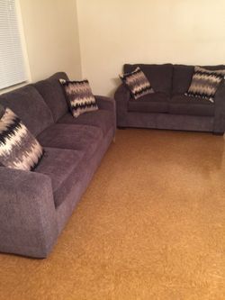 Grey sofa and love seat