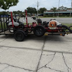 Trailer and  two  zero turn mowers  Blower Weed Whacker And Trimmer