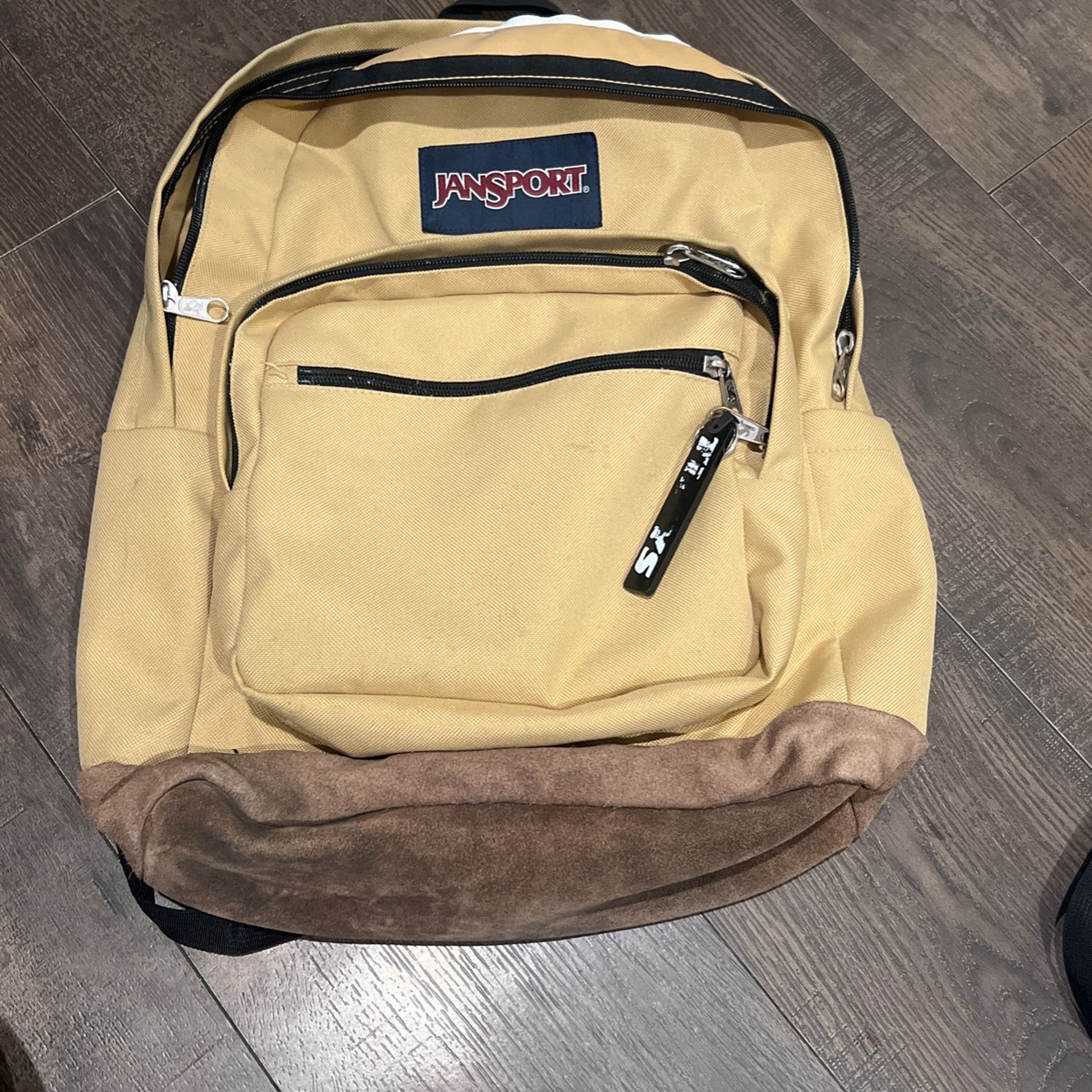 Tan Jansport Backpack