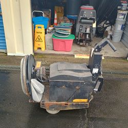 Scrubber and electric buffer