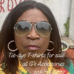 New tie-dye T-shirt for sale fits a size medium to large, others listed