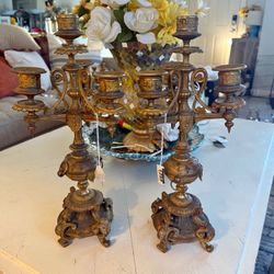 These are a pair of 19th-century French Empire style bronze candelabras.
