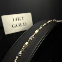 10.2 14KT YG DIA/STONE BRACELET 