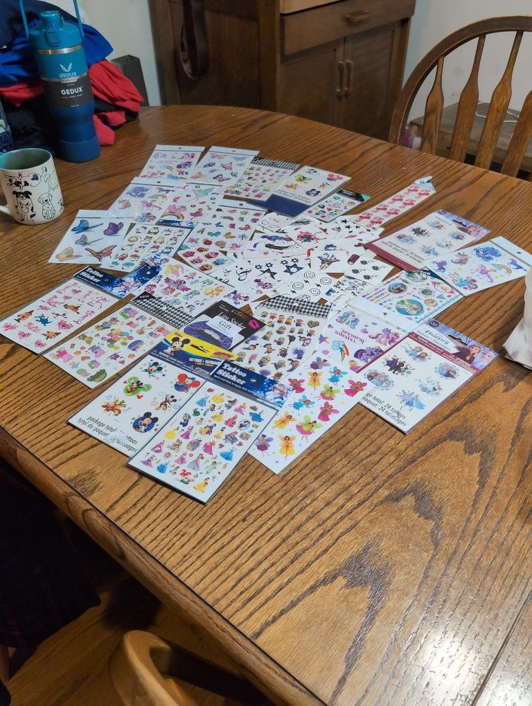 Pile Of Stickers And Tattoos