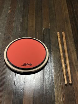 Practice Drumpad And Drum Sticks