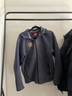 size M embroidered navy blue Nike tech