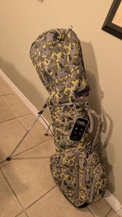 BRAND NEW OUUL GOLF STAND BAG IS PREMIUM DESIGN 5-WAY TOP 6 ZIPPERS POCKETS SINGLE STRAPS SEMI CONCEALED STAND BAG is A STYLISH ARMY CAMEL COLOR