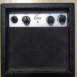 First Act Mini Guitar Amplifier Powered by x2, 9volt or AC (no AC cord)