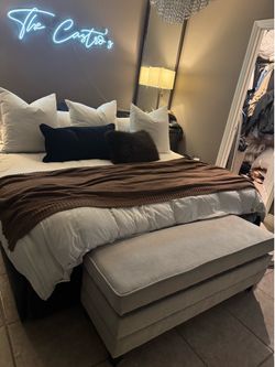Grey upholstered storage bench