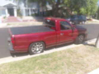 Red Pickup Truck with Tonneau Cover