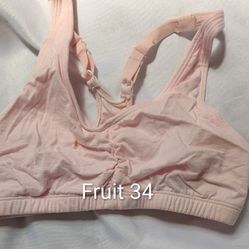 Juniors Pink Bra Fruit Of The Loom 34 Pull On, Wire Free Style 90011, 95% Cotton, 5% Spandex. DAMAGE: THERE IS A SMALL HOLE ON THE LEFT  3/4" FROM CEN