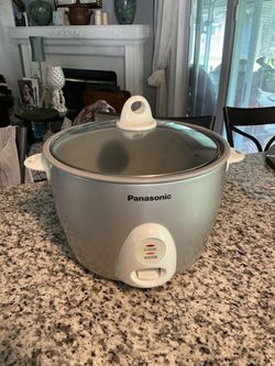 The selected appliance is the Panasonic Rice and Grain Cooker . Capacity 5 cups uncook. Is a large capacity