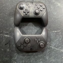 Two Nintendo Switch Pro Controllers