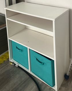 Small cubby shelf with 2 bins
