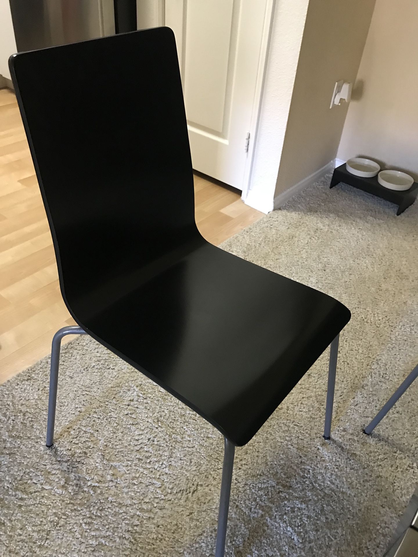 FOUR BLACK MODERN CHAIRS