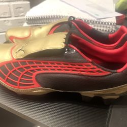 Puma v1.10 Black/Gold/Red Cleats