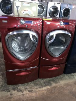 GE front load washer and electric dryer with pedestal in excellent conditions
