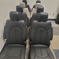 BRAND NEW BLACK LEATHER BUCKET SEATS 