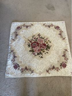 beige square tablecloth, likely featuring Gobelin-style Turkish or Syrian craftsmanship, is decorated with intricate white lace borders and a central 