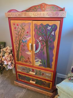 Whimsical one of a kind Armoire
Hand painted by Sticks