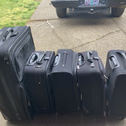5 Samsung Suitcases