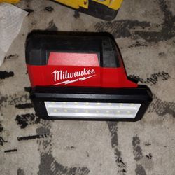 MILWAUKEE® M12™ ROVER™ Service & Repair Flood Light w/ USB Charging provides 700 lumens, up to 24 hours of run-time, and has an IP54 rating.