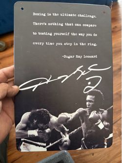 Several collectible boxing aluminum signs great for personal gym, garage