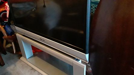 Old style flat TV size 45 inch by 25 inch screen work great with remote control Panasonic