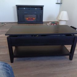 Coffee table with hidden cabinet