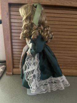 Vintage 15 Porcelain Doll In Beautiful Green Lace Trimmed Dress And Long  Curly Hair. for Sale in Beavercreek, OR - OfferUp