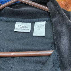 A black Velver Jacket.  For A Dreassy  Ocation.  