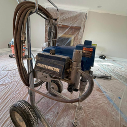 Paint spraying machine