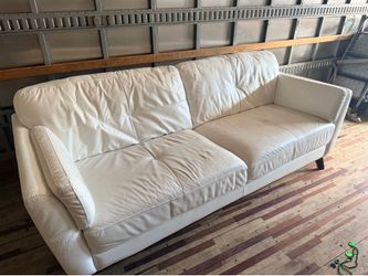 Free White Leather Sofa. One of the arm was scratched by a cat