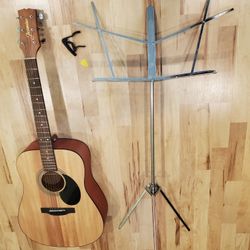 New Aucoustic Guitar With Music Stand Capo And Pick