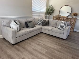 Light gray Haverty’s sectional sofa