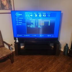 Mitsubishi 65x36 Inch TV with Stand