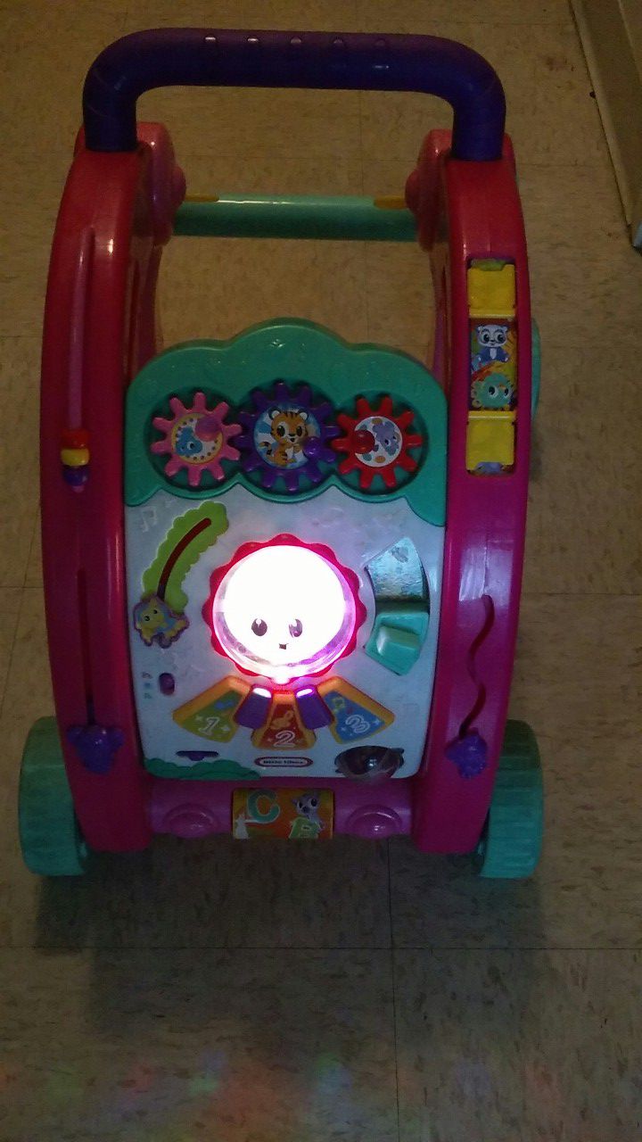 Baby walker (sings and lights up) $5