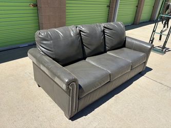 Gray Leather Sofa with Pull-Out Bed