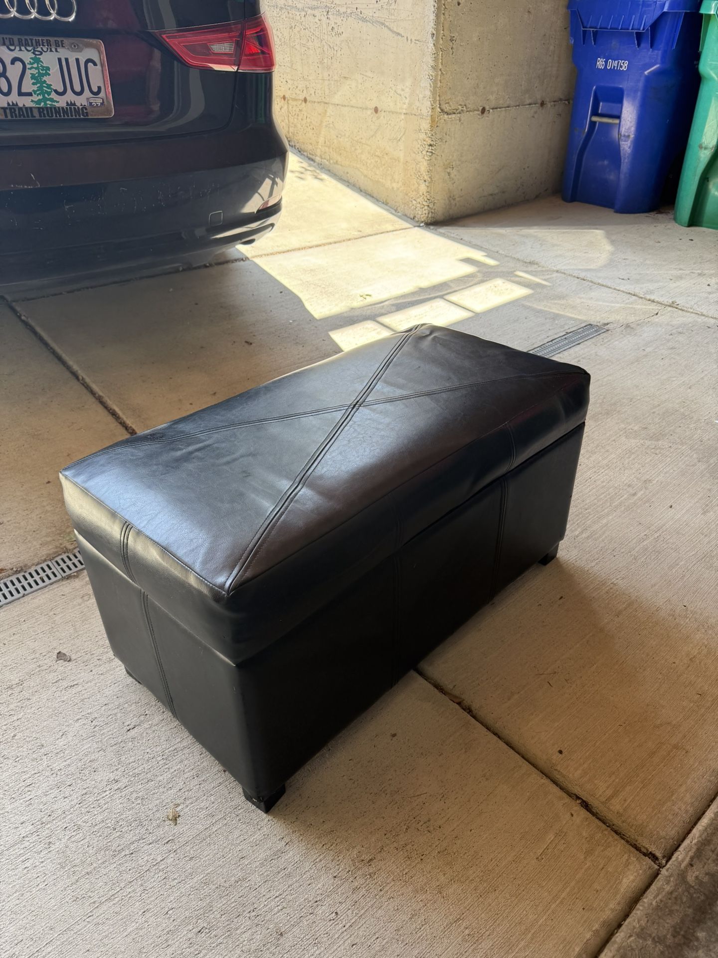 Black storage ottoman
