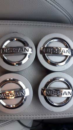 Nissan oem wheel caps #40342 AU510