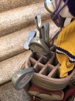 Woman’s golf clubs with bag