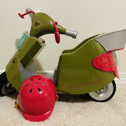 $40 American girl retired scooter with helmet. 11"Hx11"Wx17"L. For pick up only