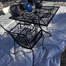 Metal Table with three chairs