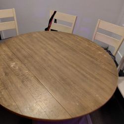 Round Table With Chairs And Cabinet Table