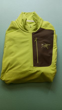 The Arcteryx Rho LT Men Zio Neck Brand New Size M