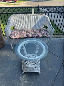 Beautiful Wicker Patio bench with table and cushion